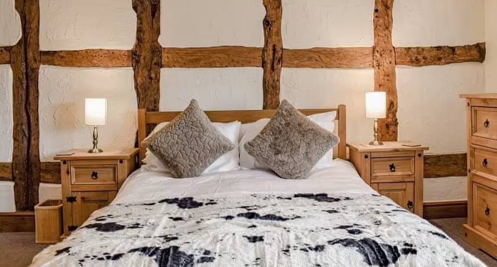 Farmhouse bedroom with comfy double bed