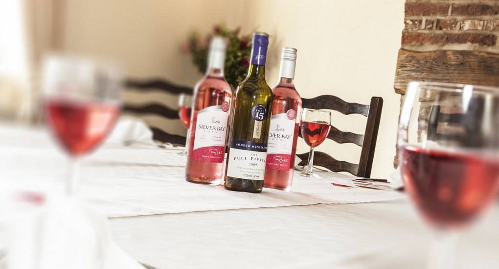 Dining room table close up view with wins and glasses